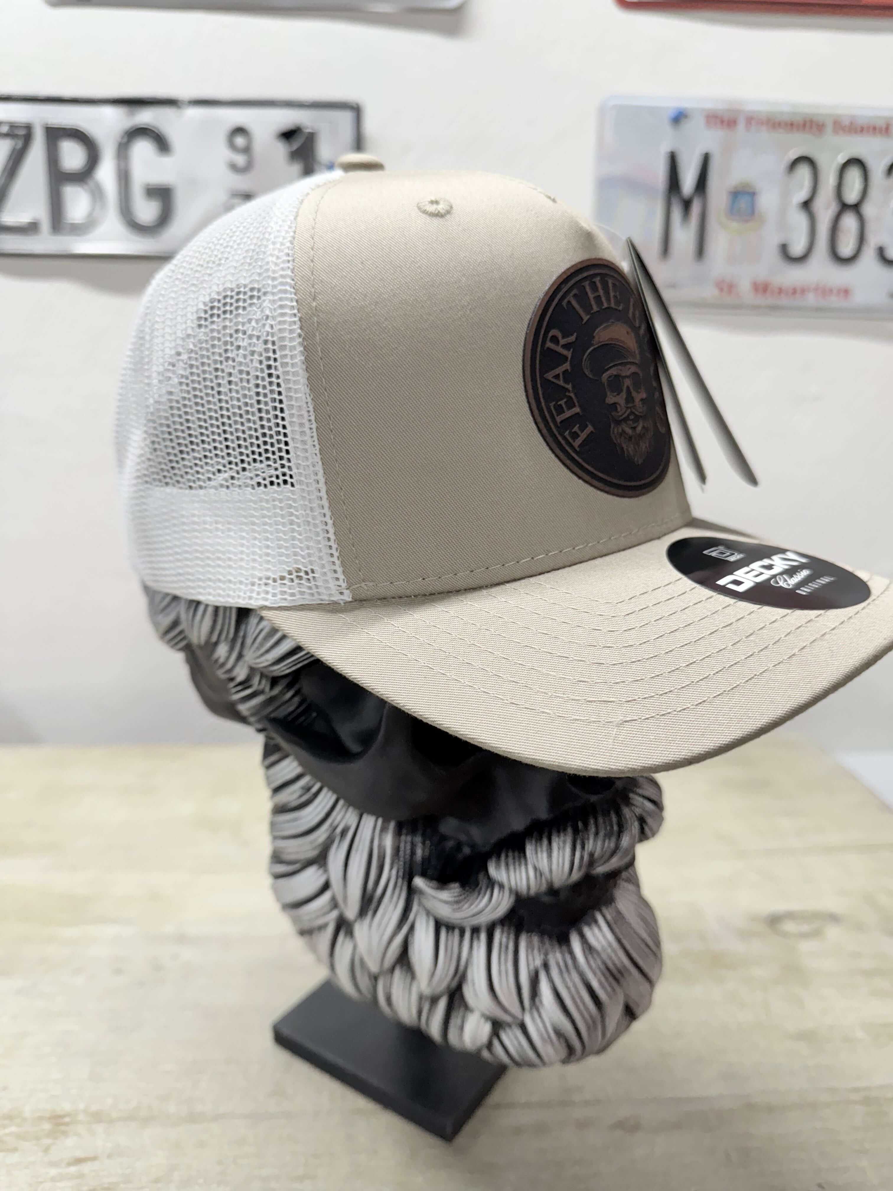 Side view of fear the beard trucker hat with leather patch, Shop Beardguyshatclub