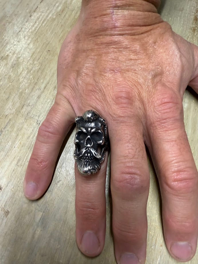 Bearded Skull Guy Men's Ring on hand, showcasing a heavy-duty stainless steel design with a bold skull motif.