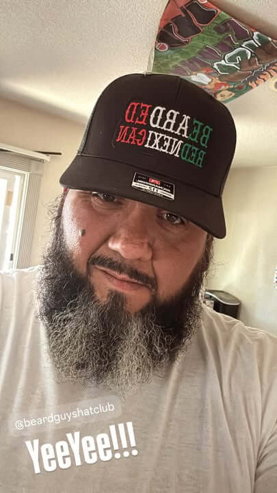 Man wearing a Bearded Rednexican Trucker Hat with a beard, showcasing Southern and Mexican pride.
