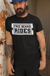 Man wearing a black tee shirt with 'Free Beard Rides' graphic printed on front, showcasing a fun and humorous style.