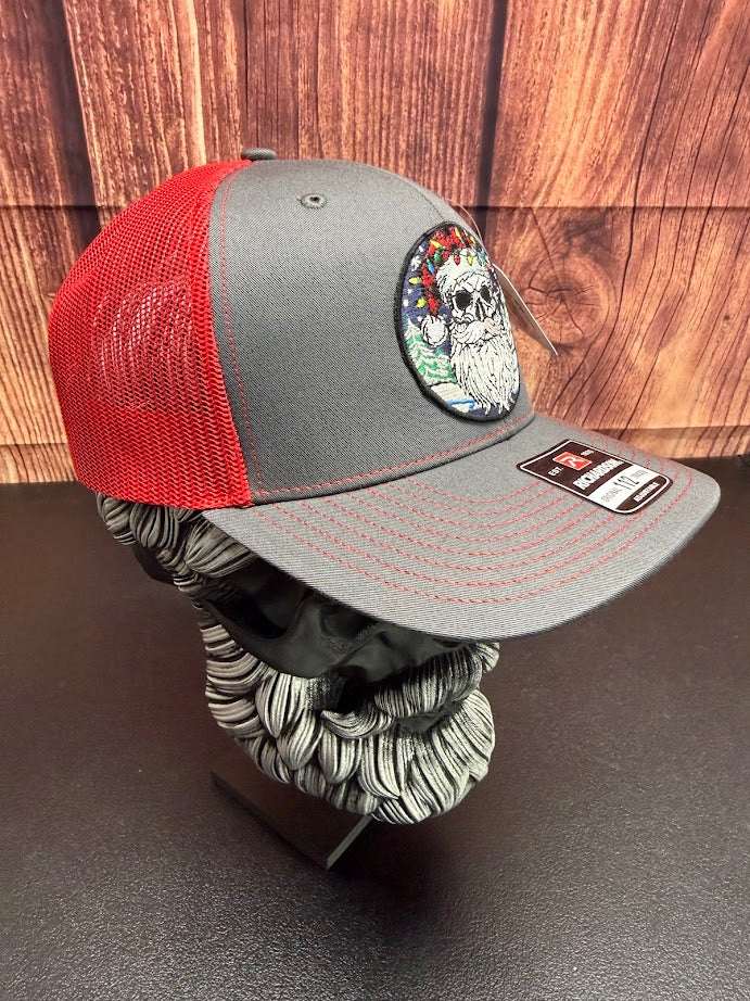 Santa Bearded Skull Holiday Beardmas Edition Richardson Hat front view  Santa Bearded Skull Holiday Beardmas Edition Richardson Hat holiday graphic  Santa Bearded Skull Holiday Beardmas Edition Richardson Hat side profile  Festive beardmas skull holiday Richardson hat close up