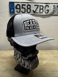 Bearded For HIS Pleasure trucker hat displayed on a bearded mannequin, showcasing its stylish design and quality.