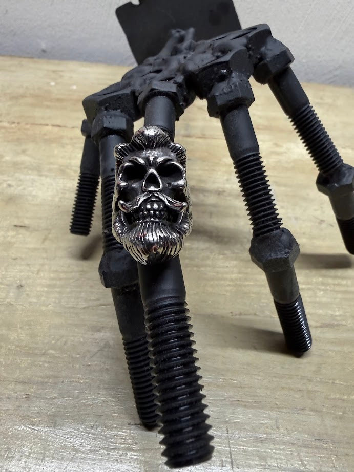 Bearded Skull Guy Men's Stainless Steel Heavy Duty Ring showcased on a unique bolt design for an edgy look.