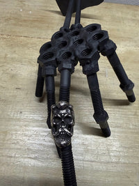 Bearded Skull Guy Men's Stainless Steel Heavy Duty Ring on a unique metal hand display.