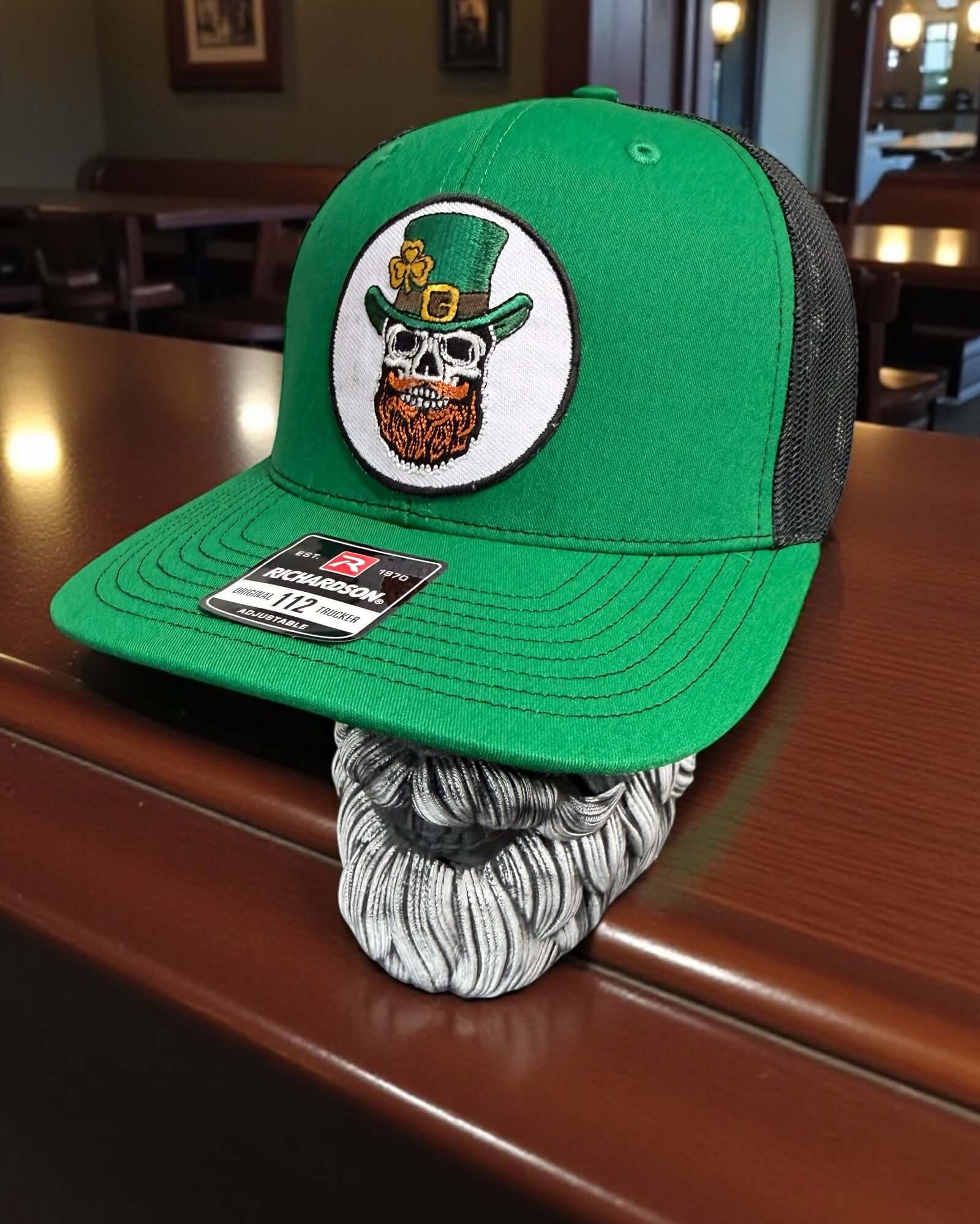 St Patrick’s Day Lucky Beard Skull Trucker Hat front view,  St Patrick’s Day Lucky Beard Skull Trucker Hat side mesh panel,  St Patrick’s Day Lucky Beard Skull Trucker Hat adjustable snapback back view,  Lucky Beard Skull graphic detail on St Patrick’s Day trucker hat