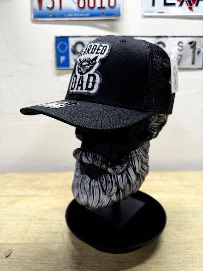 Black Beard Daddy trucker hat displayed on a bearded bust, featuring embroidered 'Beard Dad' patch.
